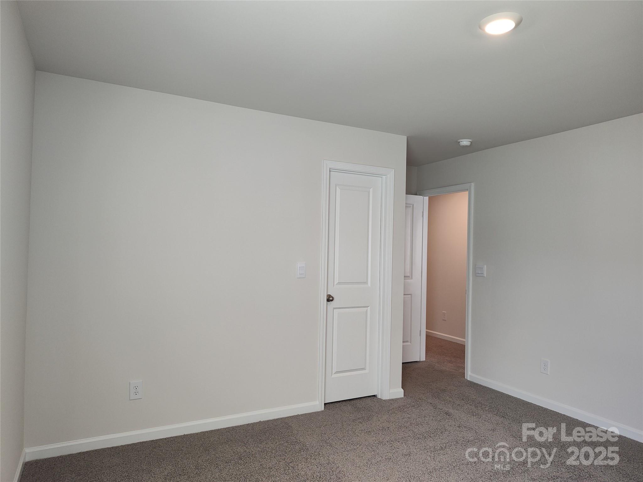 1404 Secrest Cmns Drive Monroe, NC 28112 - Photo 25 of 31 an empty room with window