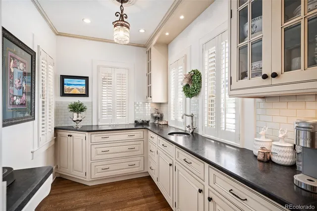 a kitchen with sink and window