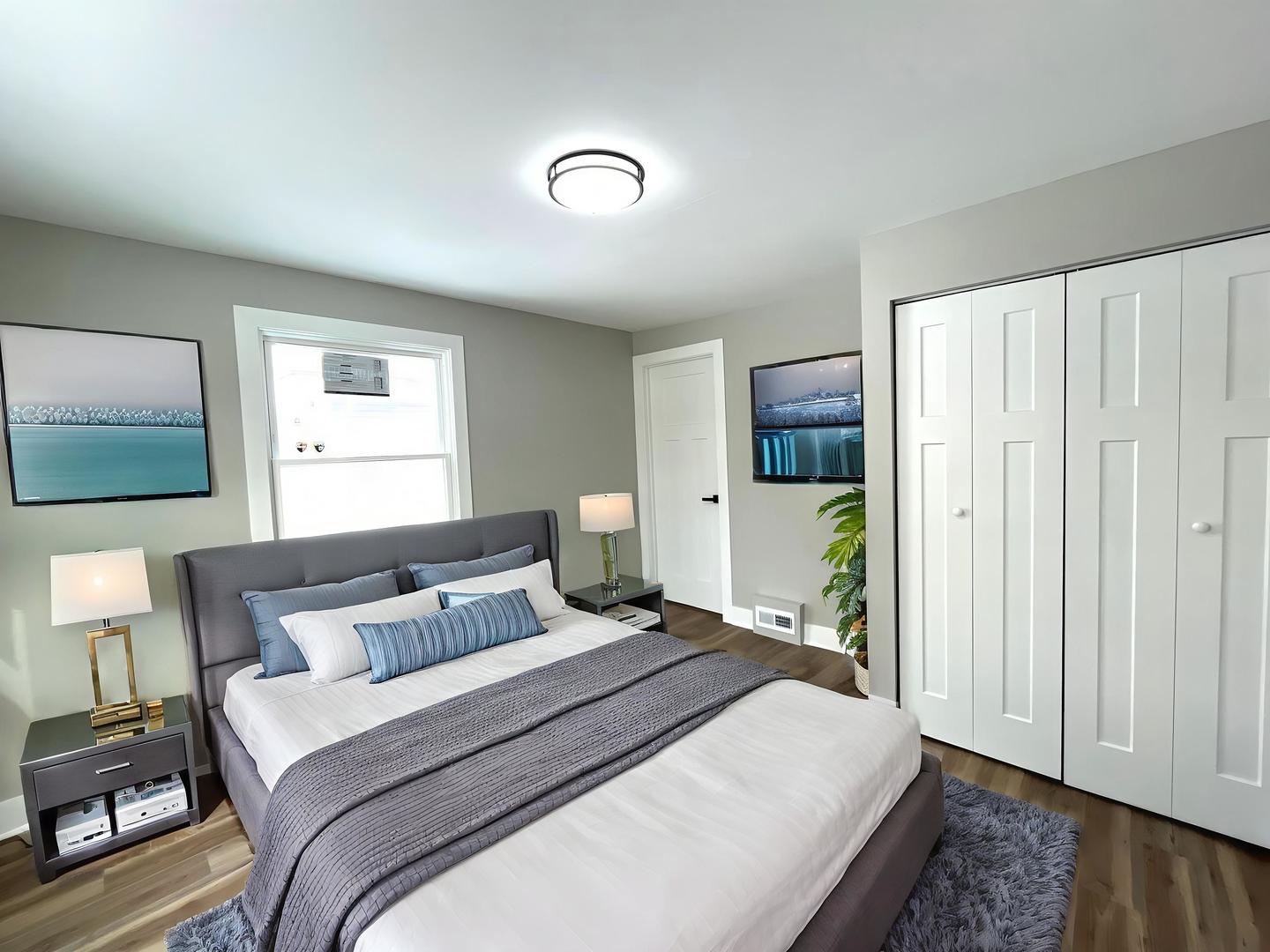 17855 Walter Street Lansing, IL 60438 - Photo 8 of 16 a bedroom with a bed and a window