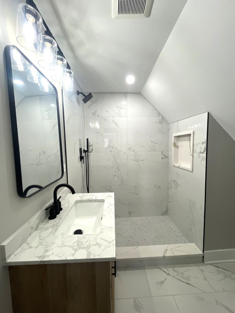 17855 Walter Street Lansing, IL 60438 - Photo 9 of 16 a bathroom with a sink a toilet and mirror