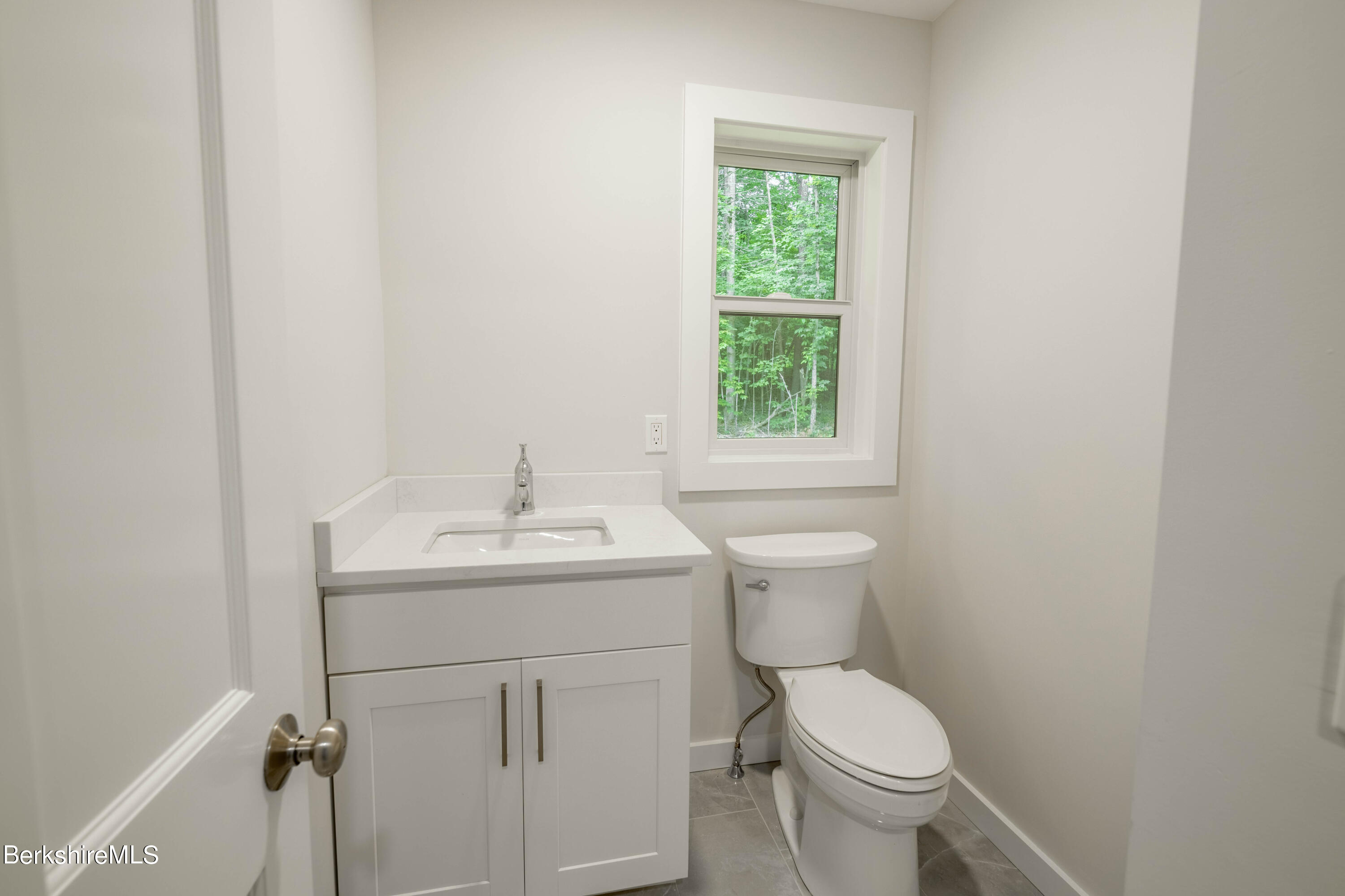 220 Hupi Road Monterey, MA 01245 - Photo 23 of 38 a bathroom with a sink toilet and a window
