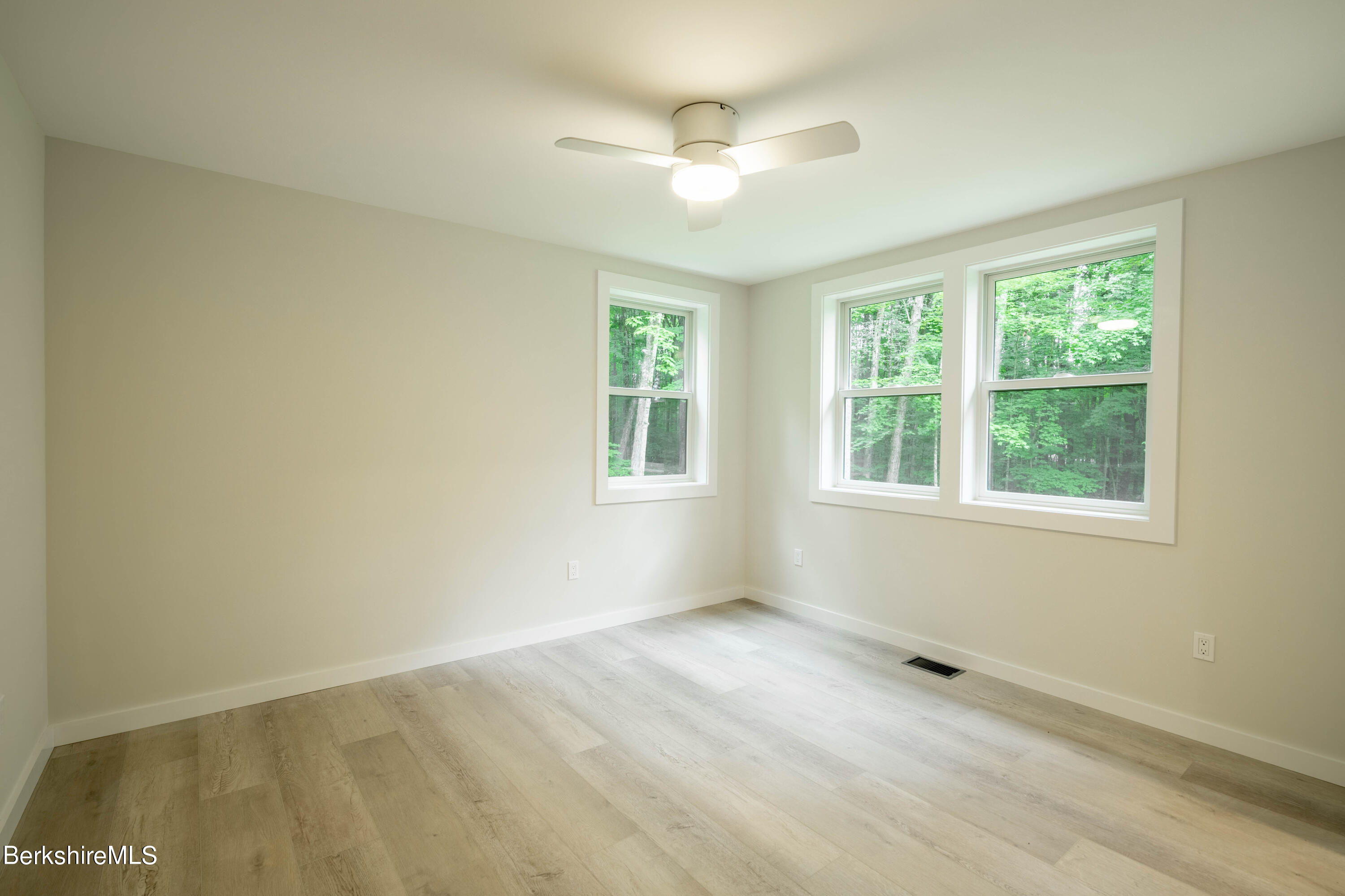 220 Hupi Road Monterey, MA 01245 - Photo 24 of 38 a view of an empty room with a window