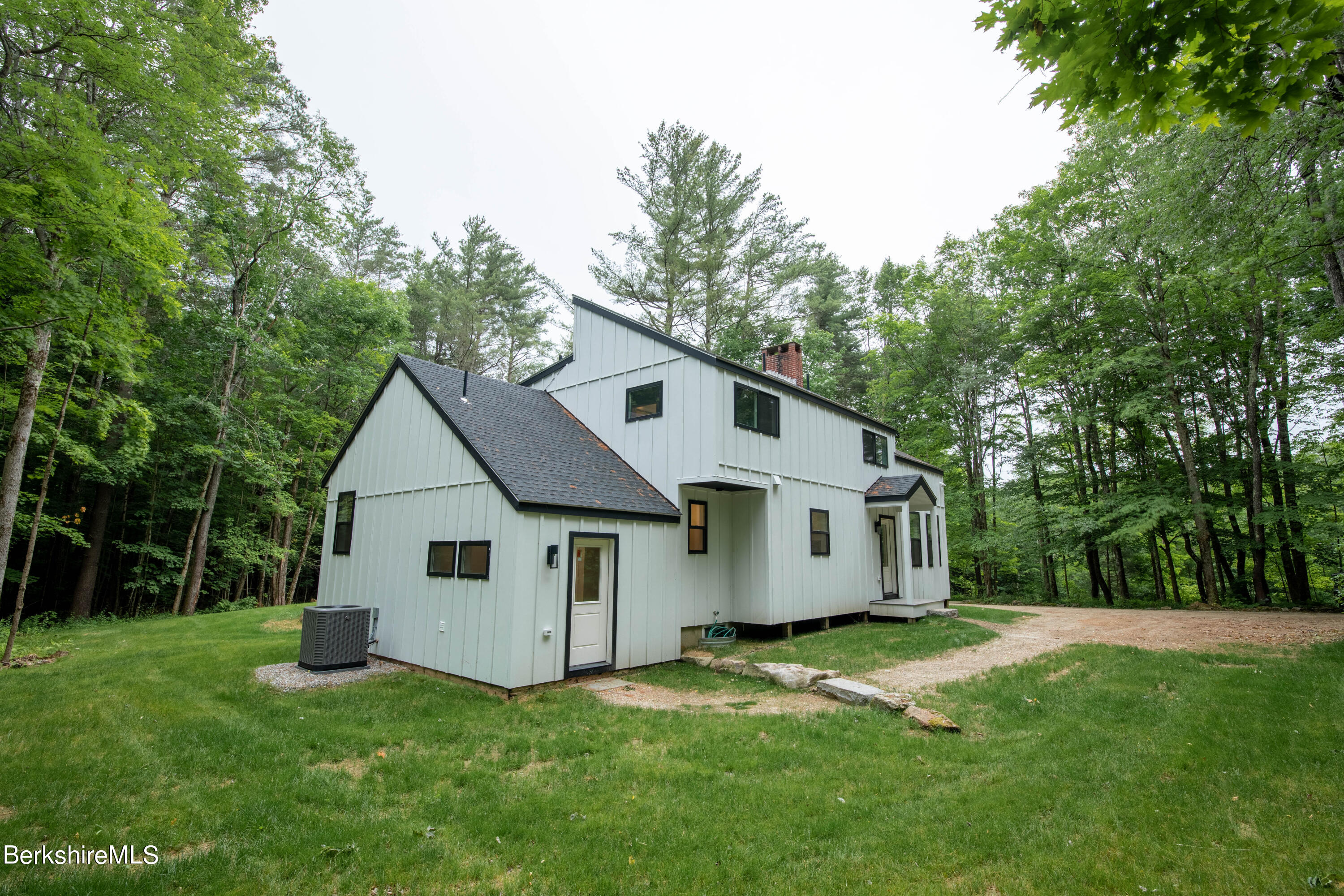220 Hupi Road Monterey, MA 01245 - Photo 5 of 38 a view of a back yard of the house
