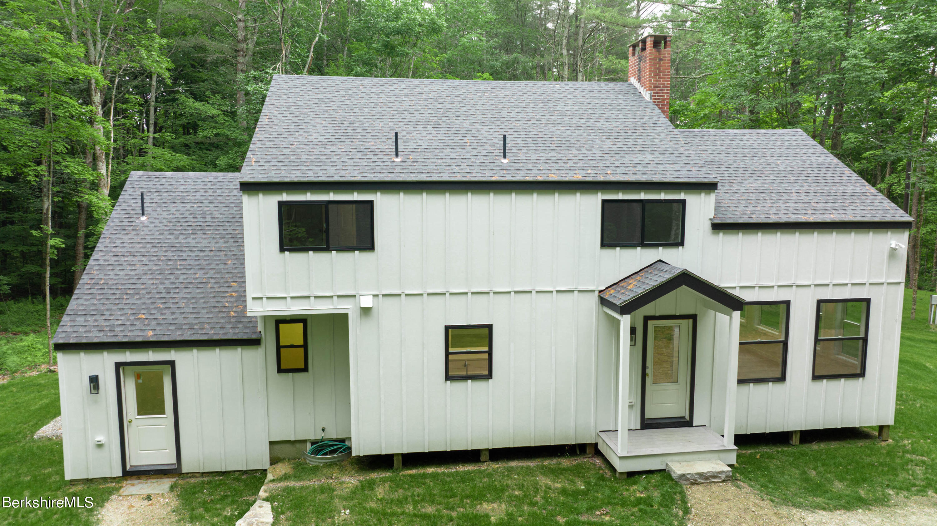 220 Hupi Road Monterey, MA 01245 - Photo 8 of 38 a aerial view of a house with a yard