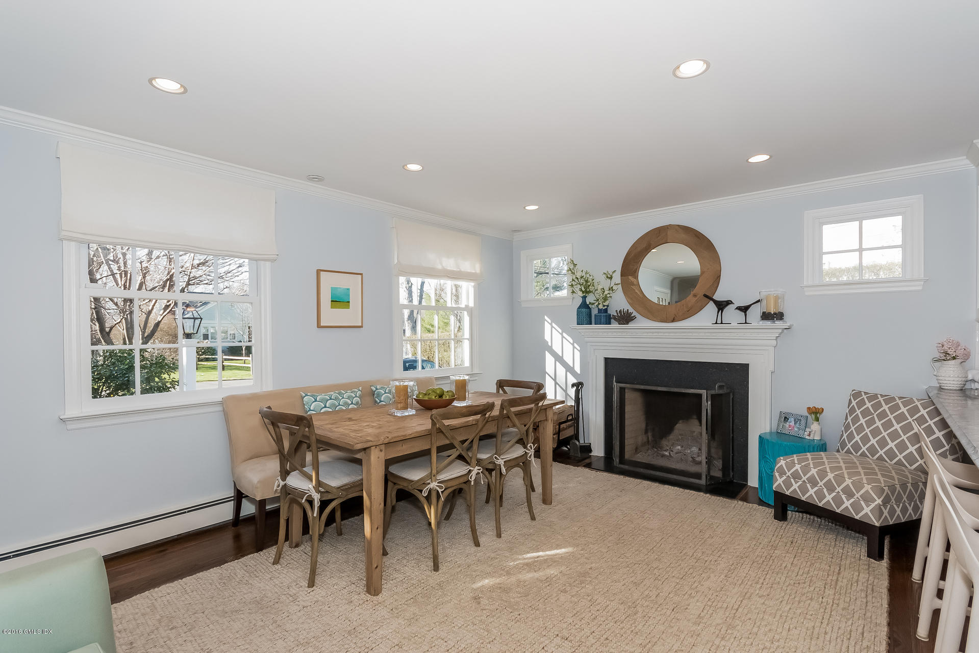 122 Hollow Tree Ridge Road Darien, CT 06820 - Photo 15 of 49 a view of a livingroom with furniture and a fireplace