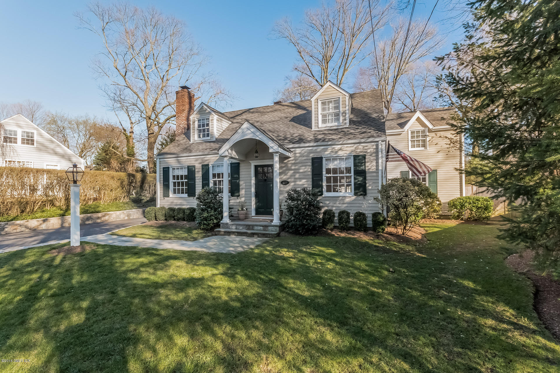 122 Hollow Tree Ridge Road Darien, CT 06820 - Photo 5 of 49 a view of a house with a yard and sitting area