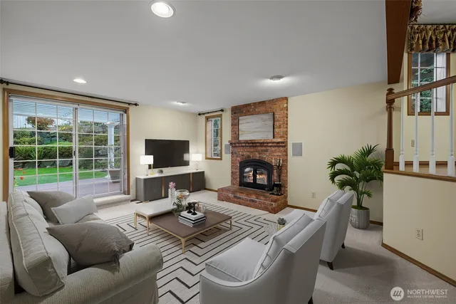 a living room with furniture fireplace and a flat screen tv