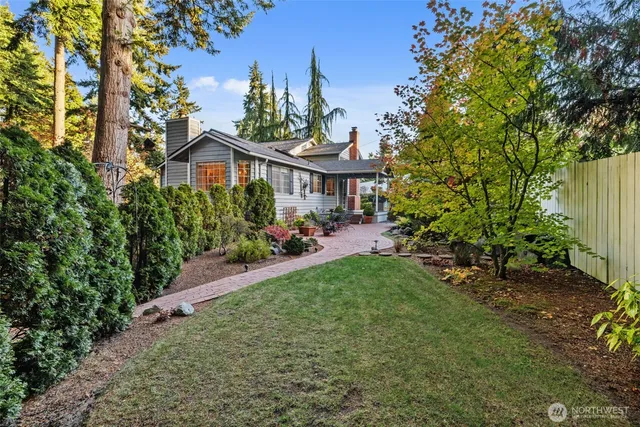 a view of a house with sitting area and furniture