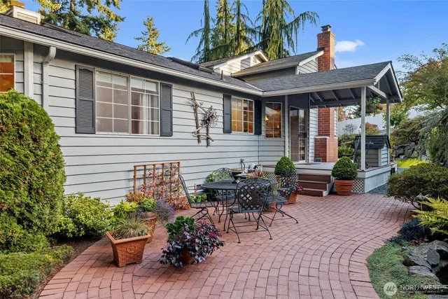 a view of a balcony with potted plants