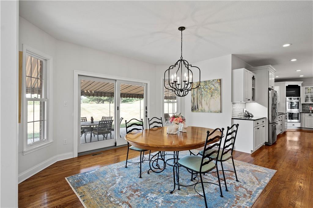 3012 East Ridge Drive Gibsonia, PA 15044 - Photo 16 of 50 a view of a dining room with furniture window and wooden floor