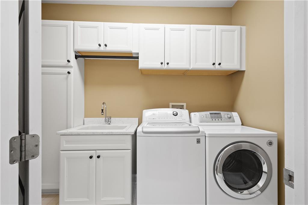 3012 East Ridge Drive Gibsonia, PA 15044 - Photo 17 of 50 a utility room with dryer and washer