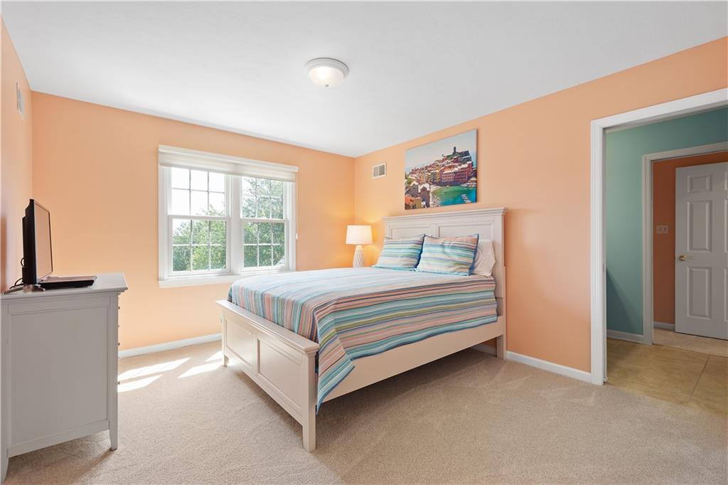 3012 East Ridge Drive Gibsonia, PA 15044 - Photo 18 of 50 a bedroom with a bed and a large window