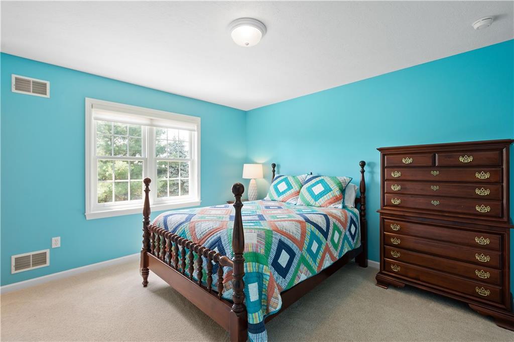 3012 East Ridge Drive Gibsonia, PA 15044 - Photo 21 of 50 a bedroom with a bed and a window