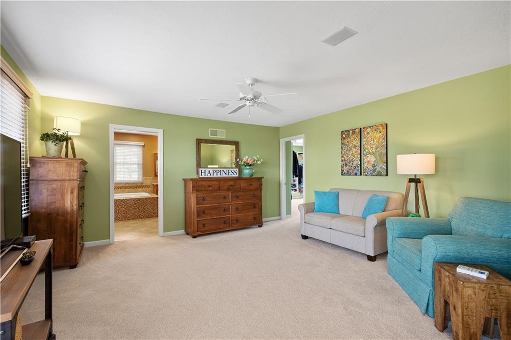 3012 East Ridge Drive Gibsonia, PA 15044 - Photo 24 of 50 a spacious bedroom with a bed a couch and dresser