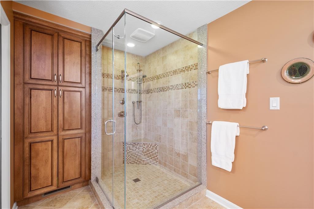 3012 East Ridge Drive Gibsonia, PA 15044 - Photo 29 of 50 a bathroom with a shower and a mirror