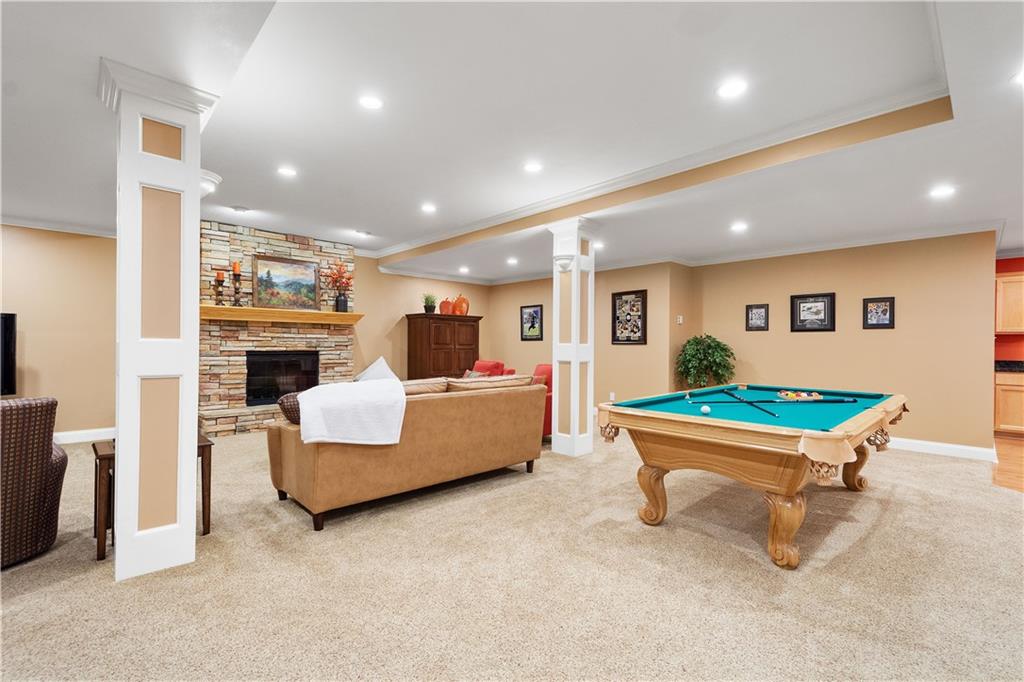 3012 East Ridge Drive Gibsonia, PA 15044 - Photo 34 of 50 a living room with furniture and a fireplace