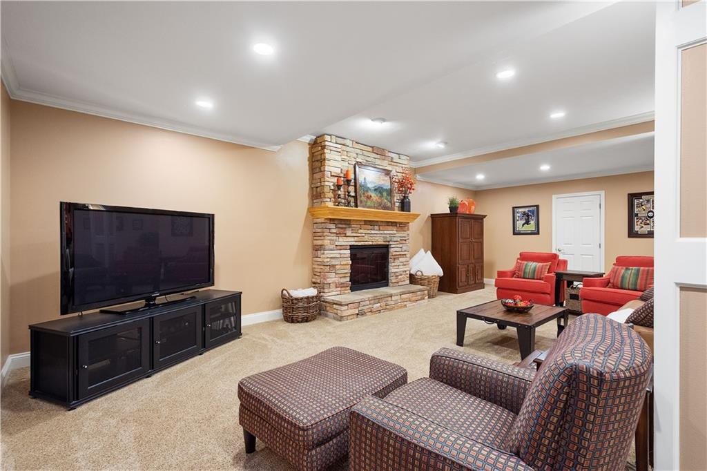3012 East Ridge Drive Gibsonia, PA 15044 - Photo 35 of 50 a living room with furniture and a flat screen tv