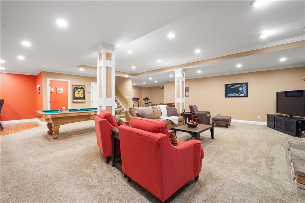 3012 East Ridge Drive Gibsonia, PA 15044 - Photo 36 of 50 a living room with furniture and a flat screen tv