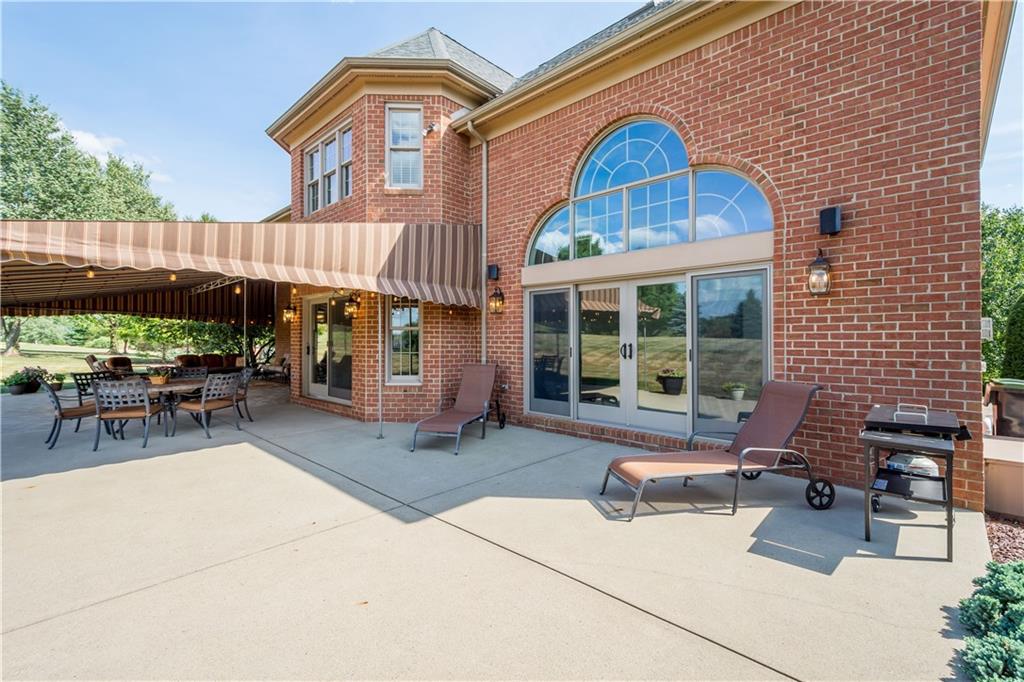 3012 East Ridge Drive Gibsonia, PA 15044 - Photo 41 of 50 a building outdoor space with patio furniture and potted plants