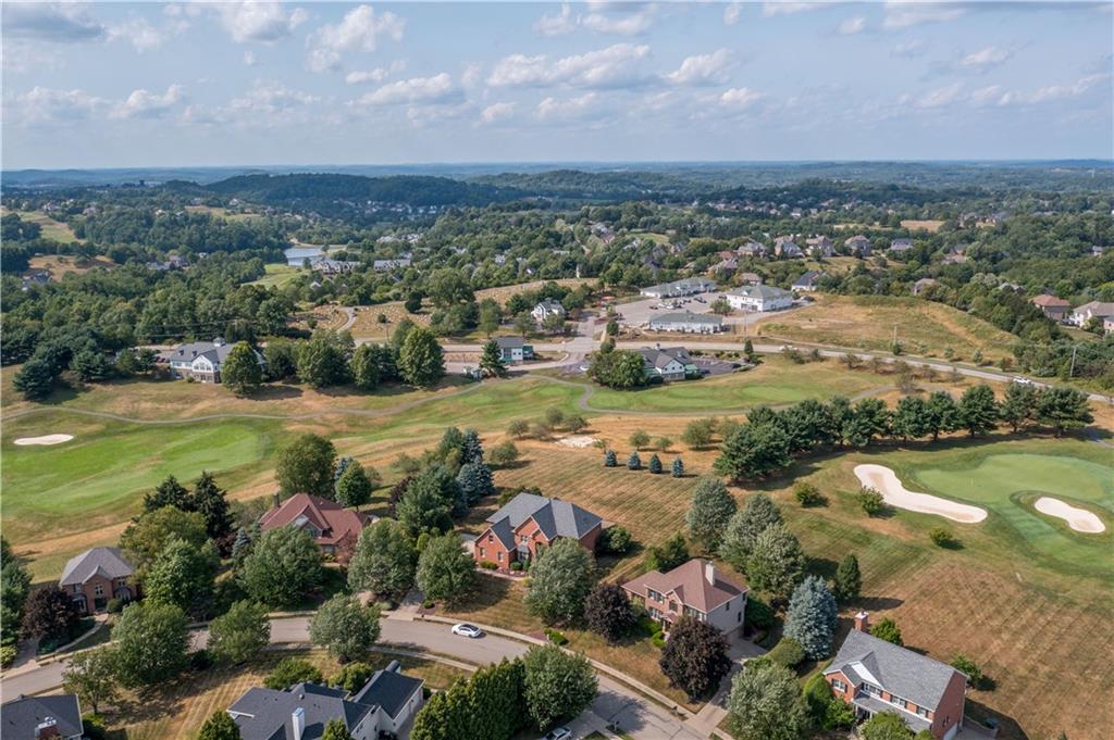 3012 East Ridge Drive Gibsonia, PA 15044 - Photo 43 of 50 an aerial view of a city with lots of residential buildings ocean and mountain view in back