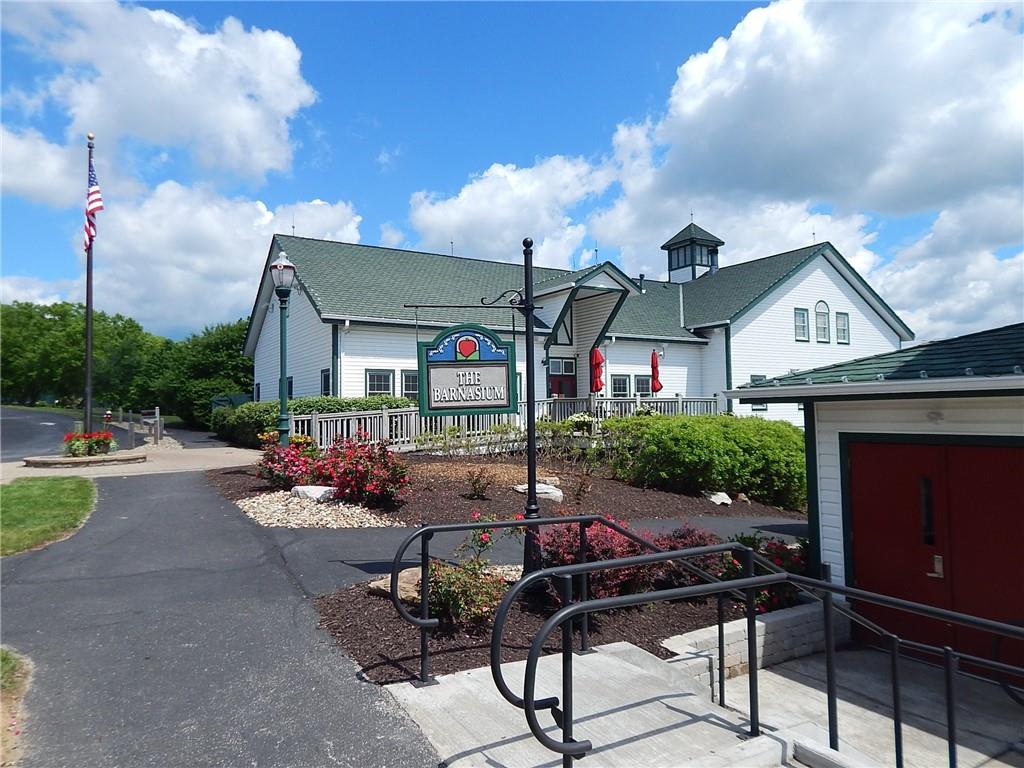 3012 East Ridge Drive Gibsonia, PA 15044 - Photo 48 of 50 a view of a patio with couches table and chairs and potted plants