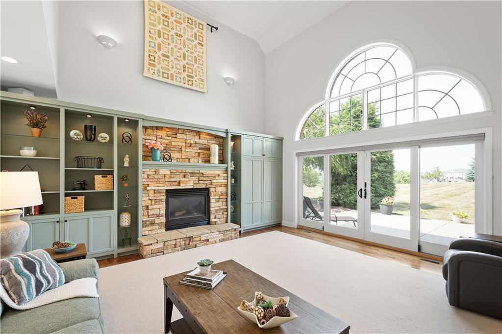 3012 East Ridge Drive Gibsonia, PA 15044 - Photo 9 of 50 a living room with furniture a fireplace and a large window