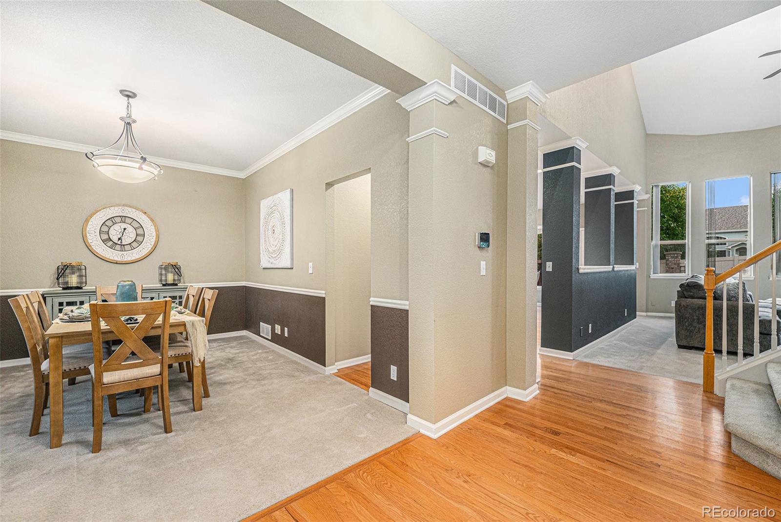 9705 Carr Circle Westminster, CO 80021 - Photo 13 of 43 a view of a livingroom with furniture and wooden floor
