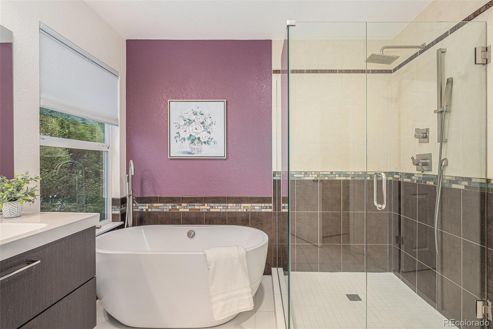 9705 Carr Circle Westminster, CO 80021 - Photo 24 of 43 a bath tub sitting next to a white sink