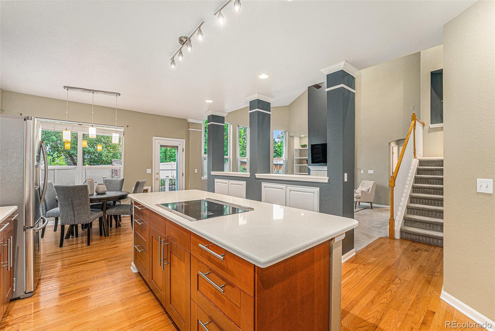 9705 Carr Circle Westminster, CO 80021 - Photo 4 of 43 a kitchen with sink and view of living room