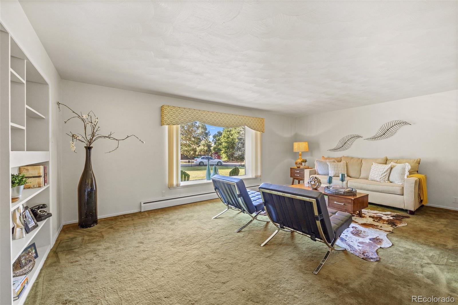 13780 Crabapple Road Golden, CO 80401 - Photo 11 of 39 a living room with furniture and a window