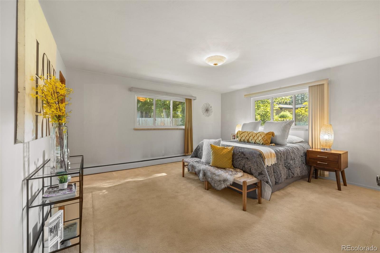 13780 Crabapple Road Golden, CO 80401 - Photo 12 of 39 a bedroom with a bed and a window