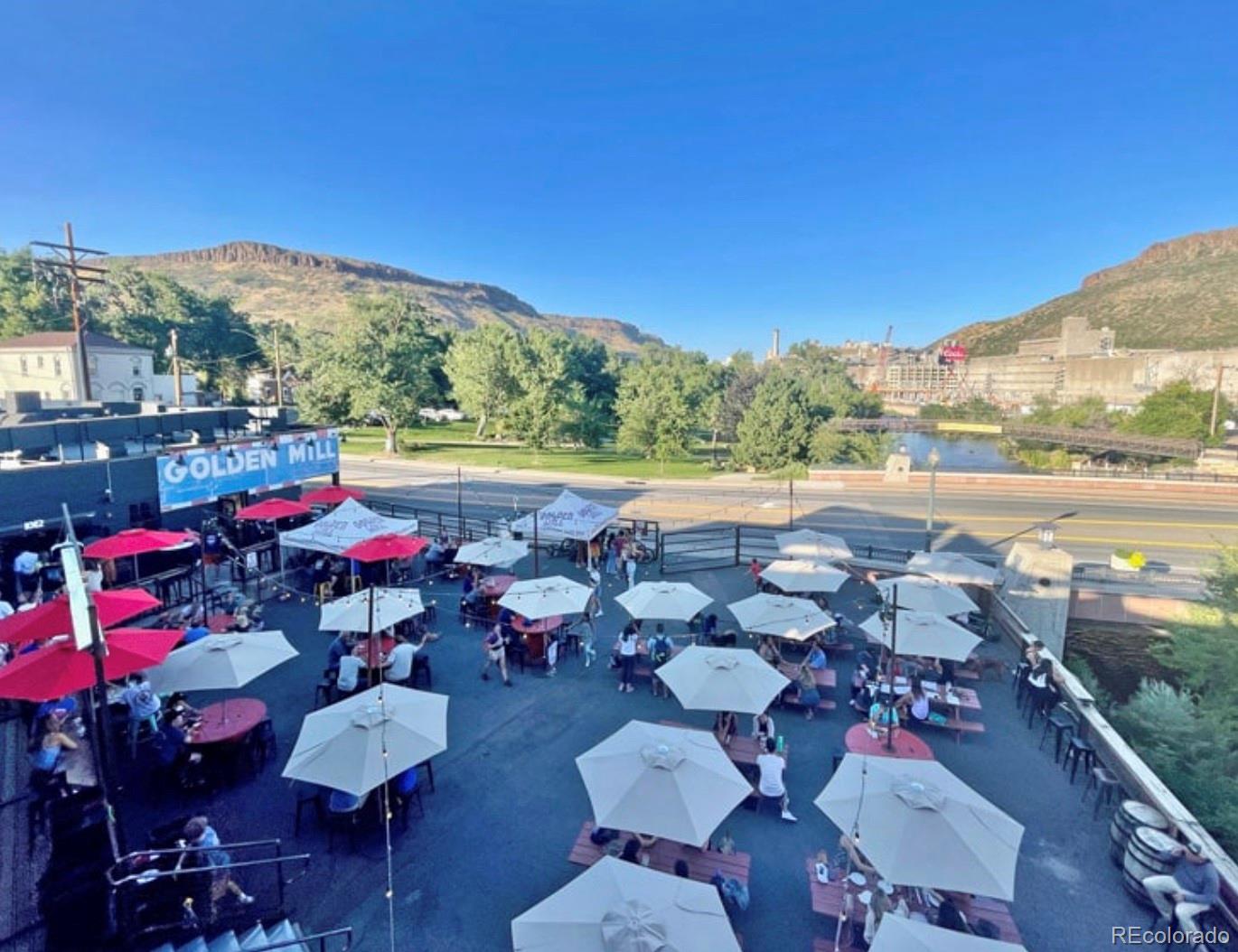 13780 Crabapple Road Golden, CO 80401 - Photo 36 of 39 a view of swimming pool with outdoor seating