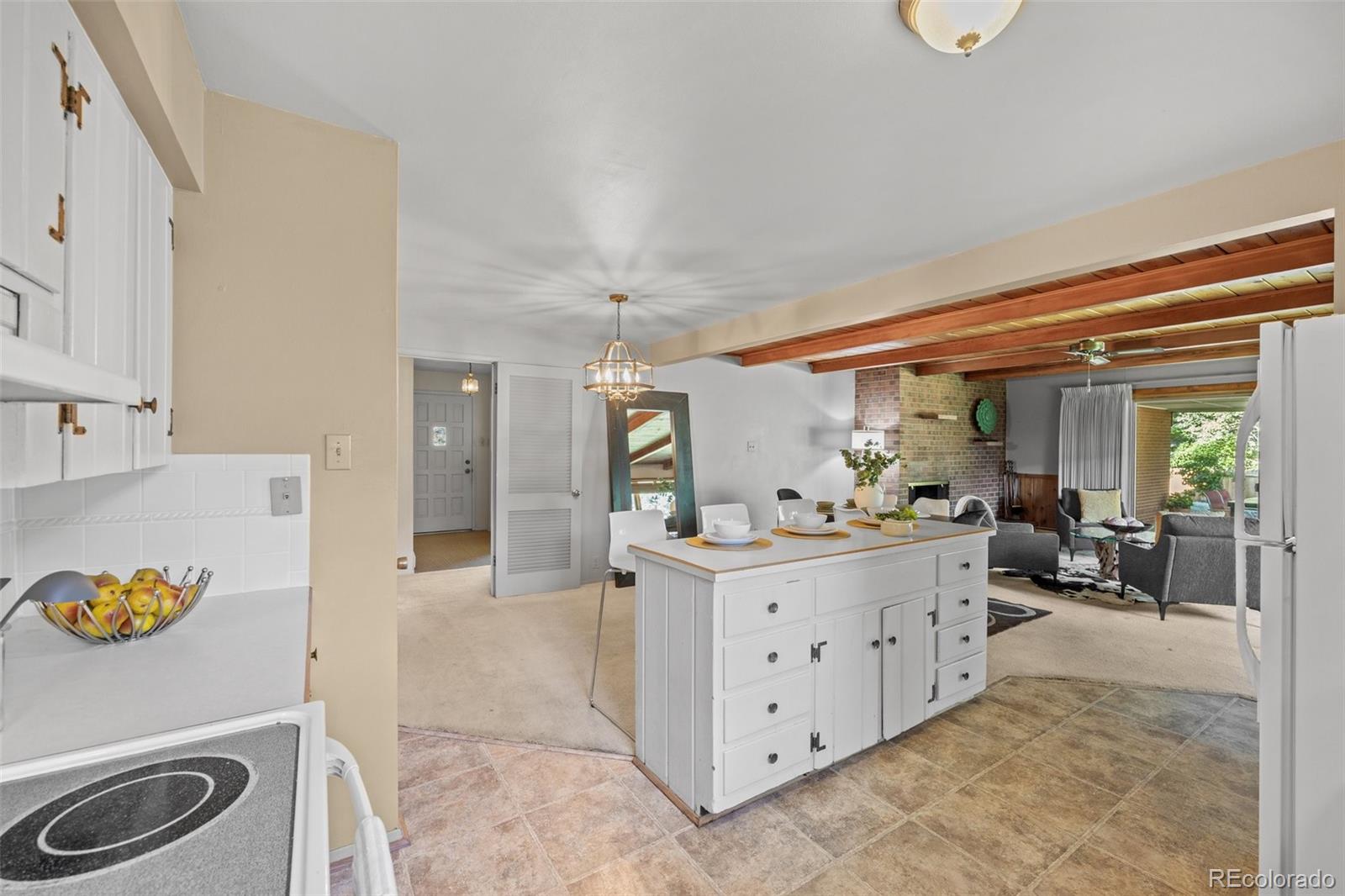 13780 Crabapple Road Golden, CO 80401 - Photo 6 of 39 a view of living room and kitchen