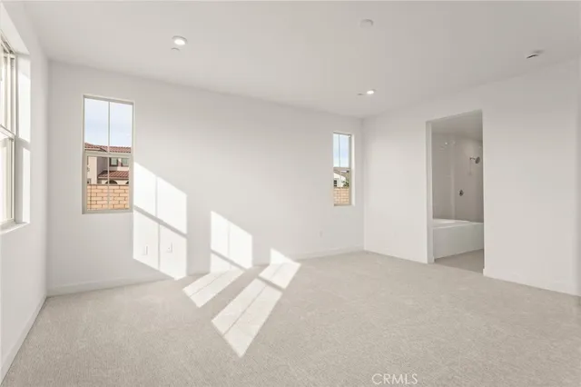 an empty room with windows