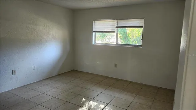 an empty room with a window