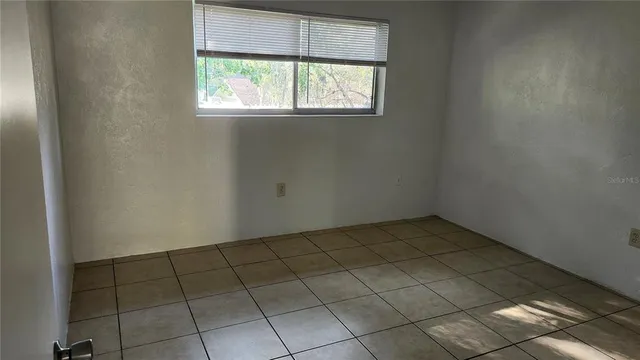 an empty room with a window