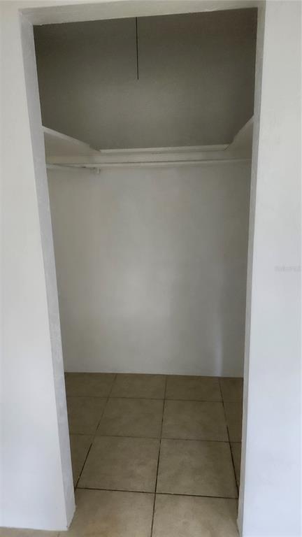 1216 Kennedy Road, Unit 10 Daytona Beach, FL 32117 - Photo 9 of 14 a view of cupboard