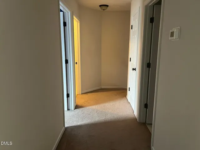 a bathroom with a bathtub and a window
