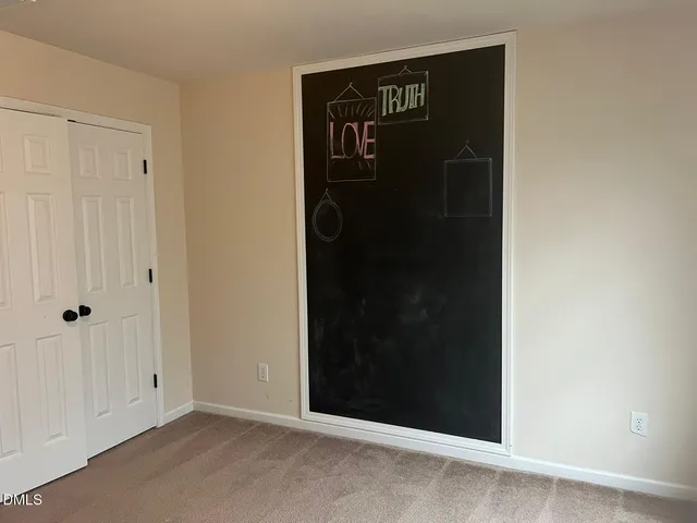 an empty room with closet