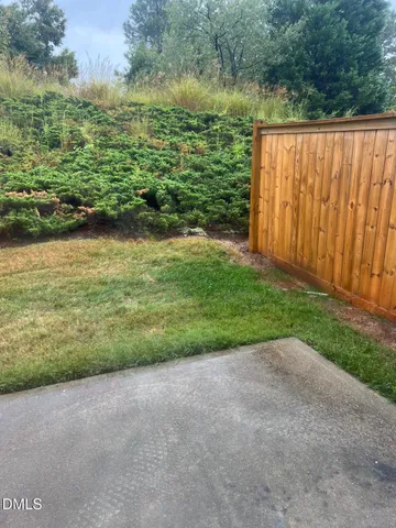 a view of a park with swings and slides