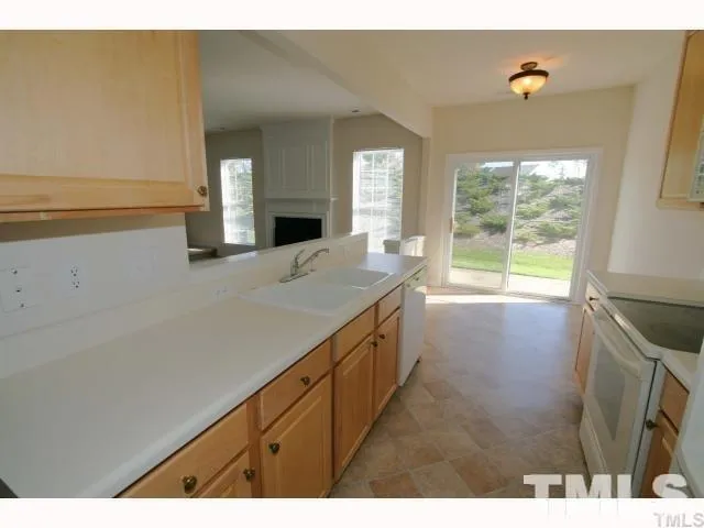 a bathroom with a sink a mirror and a bathtub