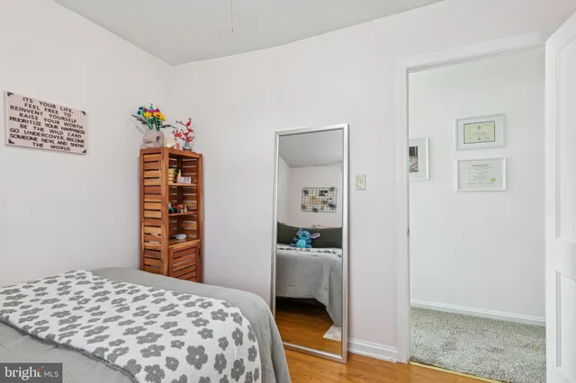 a bedroom with a bed and furniture