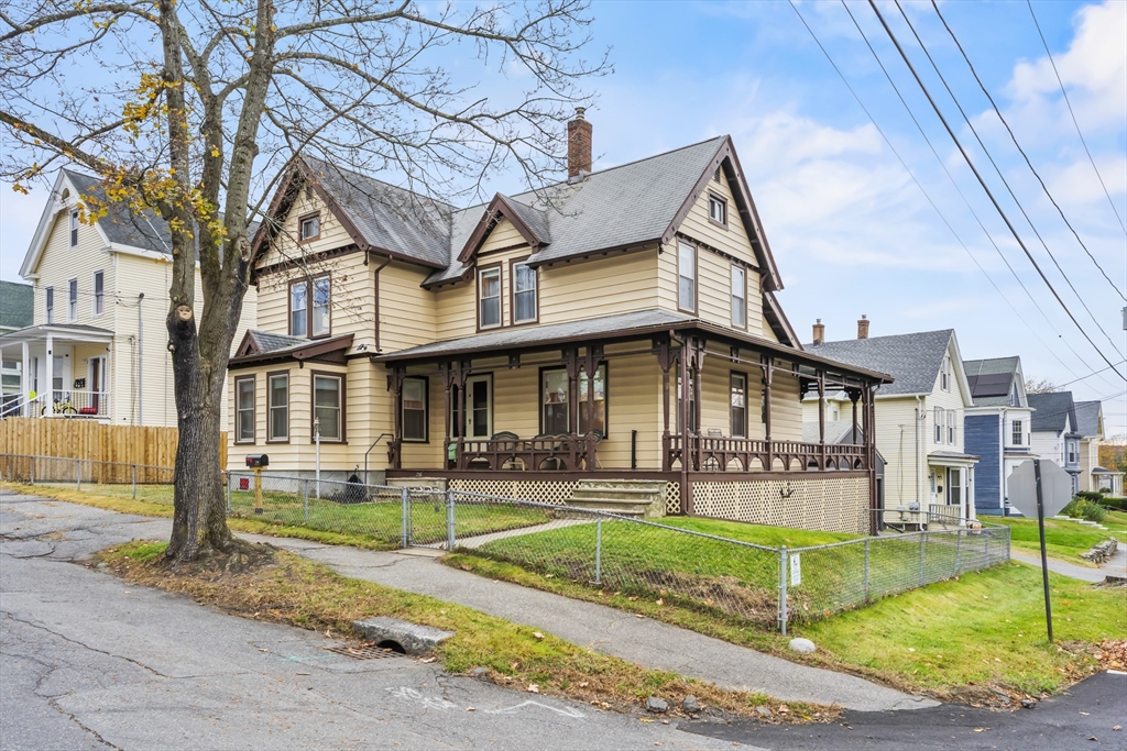 216 Walnut Street Clinton, MA 01510 - Photo 2 of 40 a front view of a house with garden