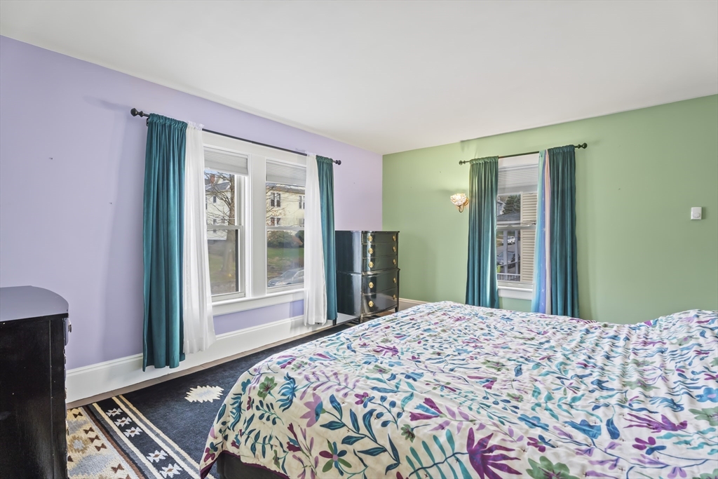 216 Walnut Street Clinton, MA 01510 - Photo 26 of 40 a bedroom with a bed and a window