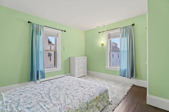 a bedroom with a bed and closet