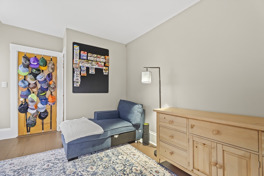 216 Walnut Street Clinton, MA 01510 - Photo 31 of 40 a living room with furniture and wooden floor