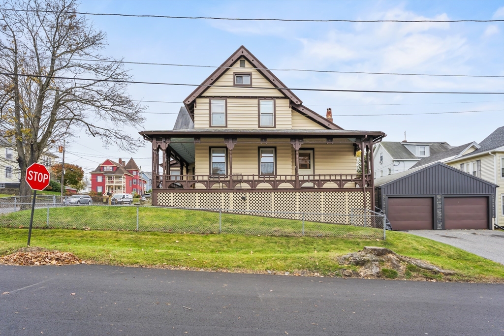 216 Walnut Street Clinton, MA 01510 - Photo 33 of 40 a front view of a house with garden