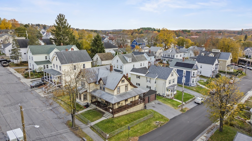 216 Walnut Street Clinton, MA 01510 - Photo 5 of 40 a view of a city with tall buildings