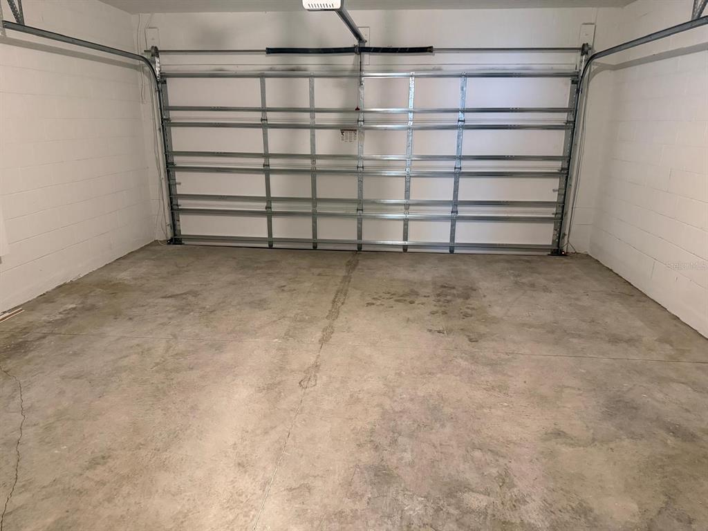 4264 Ranch House Road St. Cloud, FL 34772 - Photo 26 of 34 a view of a room with an empty racks