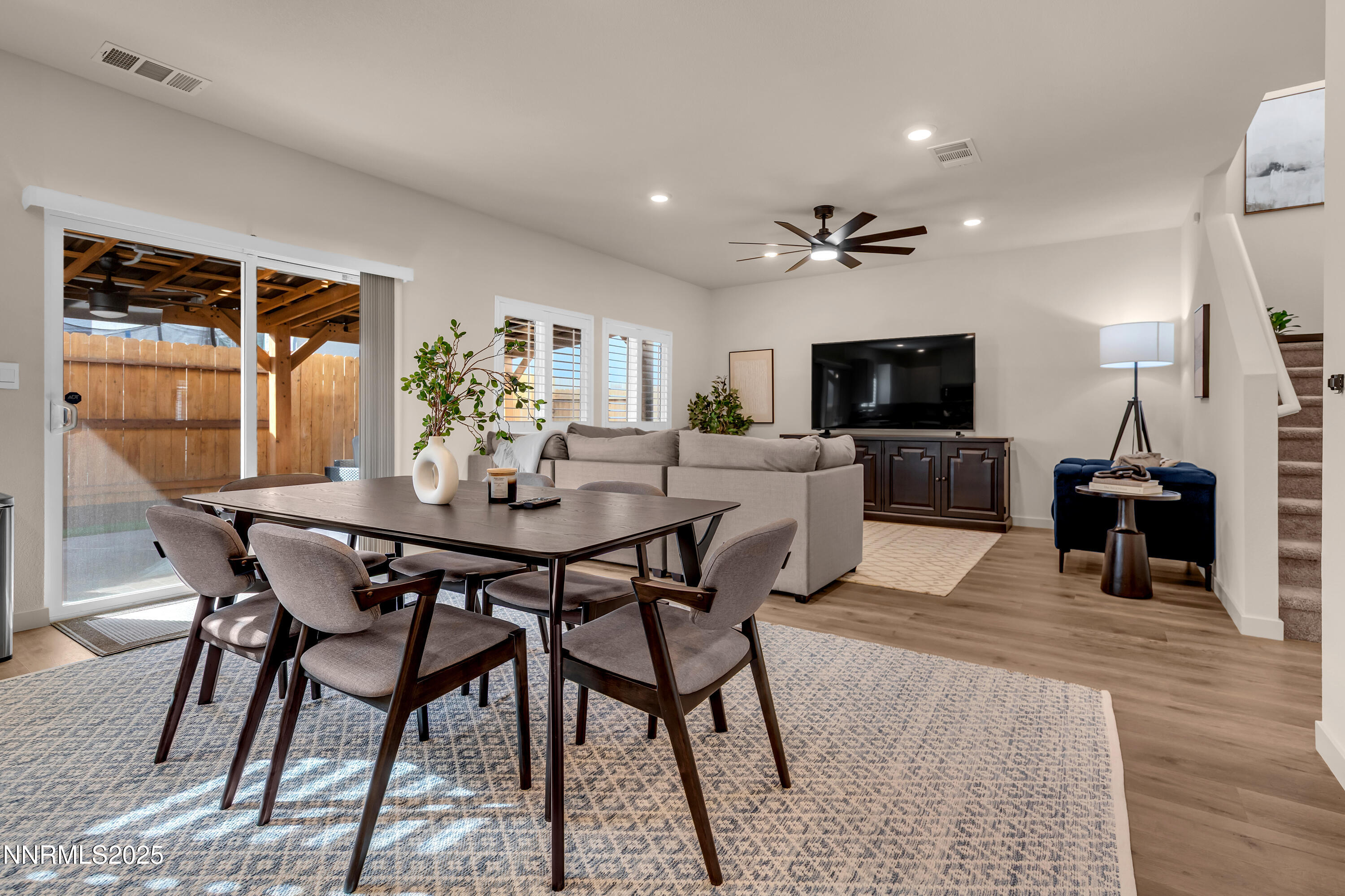 7754 Wandering Way Reno, NV 89506 - Photo 13 of 37 a view of a dining room with furniture
